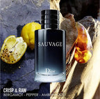 Dior Sauvage perfume bottle with lemons and amber on a textured background