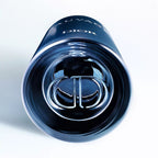 Blue Dior lip balm on a light gray background