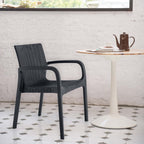 Set of Four 24" Black Faux Rattan Heavy Duty Plastic Outdoor Stacking Arm Chairs