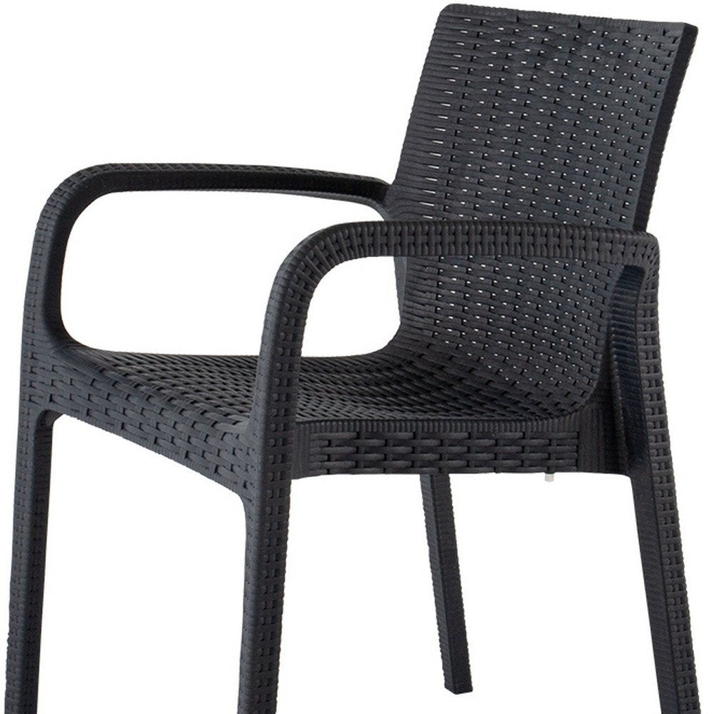 Set of Four 24" Black Faux Rattan Heavy Duty Plastic Outdoor Stacking Arm Chairs