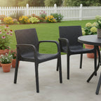 Set of Two Black Faux Rattan Heavy Duty Plastic Outdoor Stacking Arm Chairs