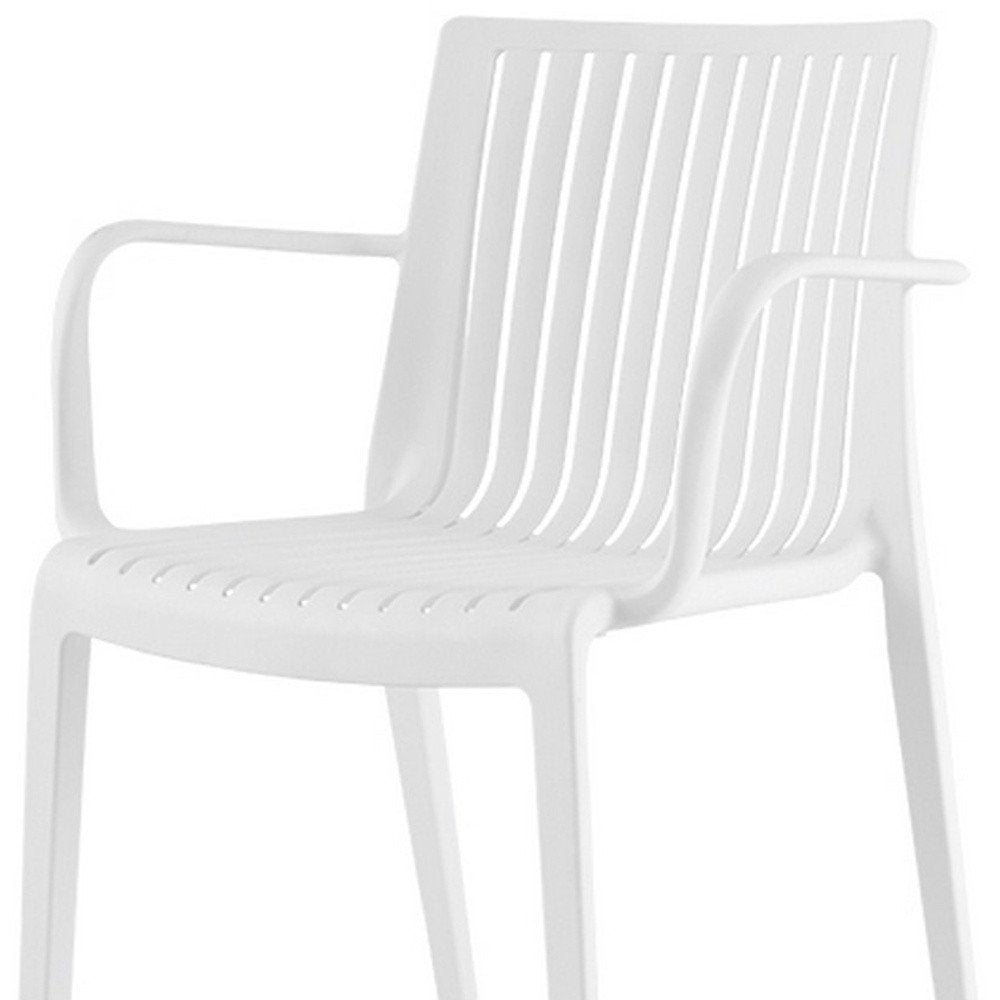 Set of Four 22" White Heavy Duty Plastic Outdoor Stacking Arm Chairs