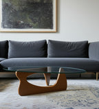 54" Clear and Brown Glass and Wood Triangle Abstract Coffee Table