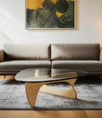 54" Clear and Natural Glass and Wood Triangle Abstract Coffee Table