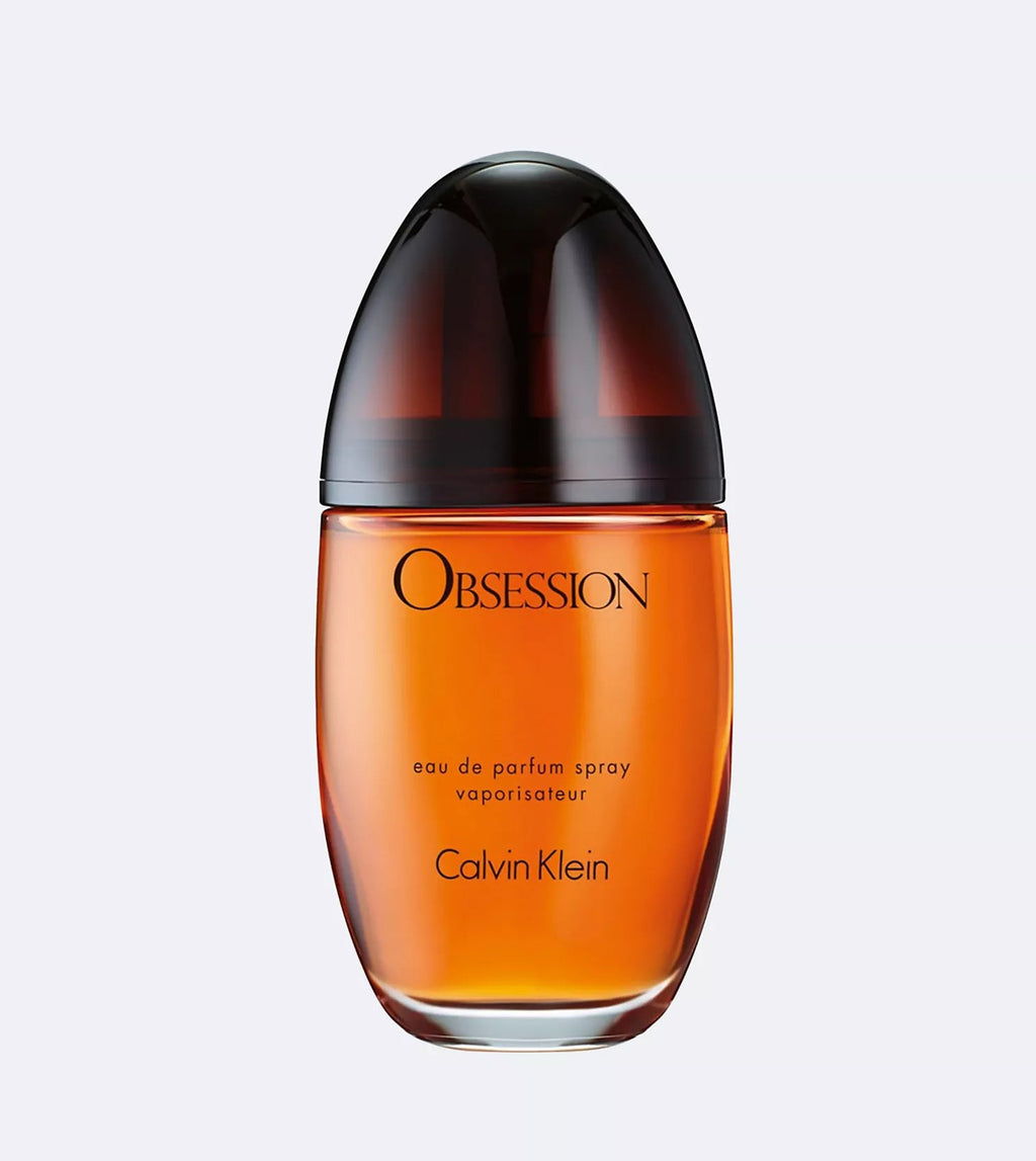Calvin Klein Obsession perfume bottle on a light gray background