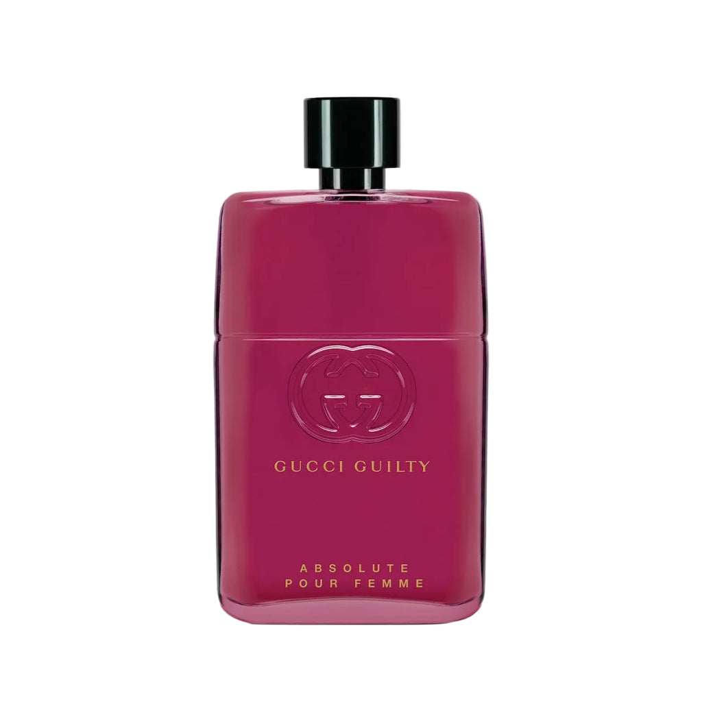 Pink Gucci Guilty Absolute Pour Femme perfume bottle on a light gray background